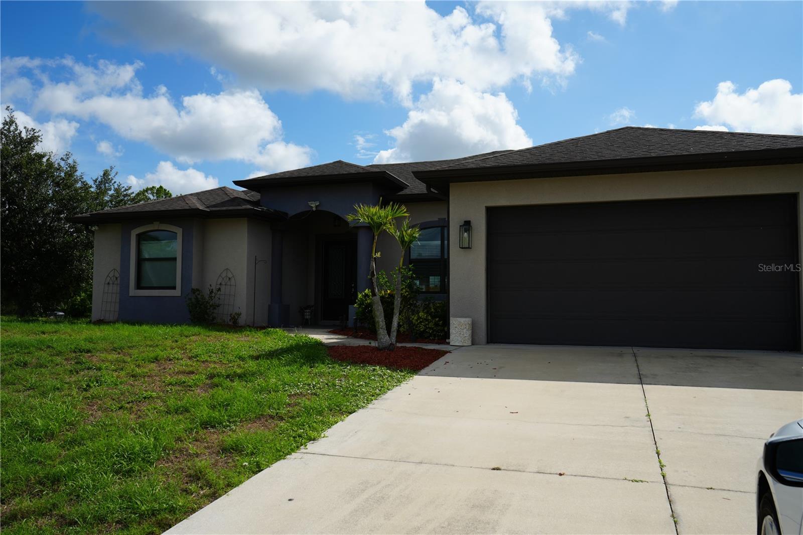Welcome to this well-maintained 3-bedroom, 2-bathroom home situated on a corner lot, nestled in a quiet, peaceful neighborhood, in the heart of North Port, Florida. Built in 2016, this property offers the perfect blend of modern living and Florida Charm. Open Concept layout with split bedroom floor plan. Primary suite with en-suite bath. Spacious kitchen with modern appliances and plenty of cabinet space, even has a separate pantry. Fully fenced in backyard- perfect for kids, pets, and privacy. Two car garage with ample driveway parking. Located close to shopping, schools, parks and I-75. Whether you are a first-time homebuyer, growing family, or snowbird looking for a sunny escape, this home checks all the boxes. This property is in a non-flood zone.