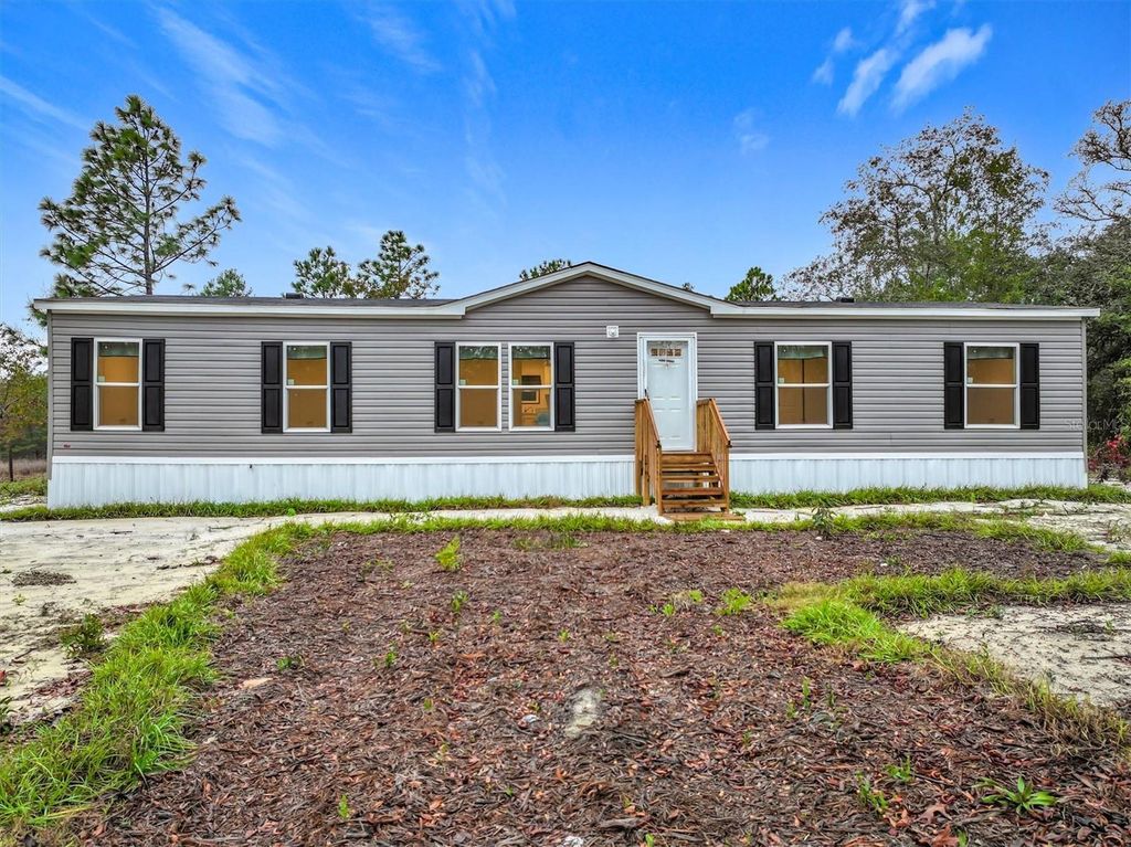 Photo of 151 Galilee Drive, Hawthorne, FL 32640 (MLS # TB8455236)