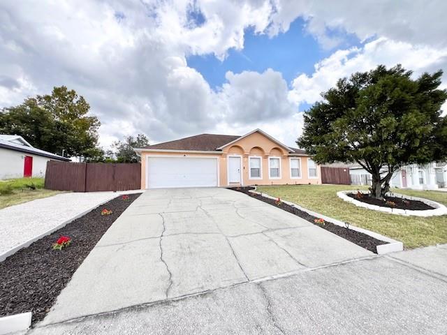 Come take a look at this Spacious Move in Ready 4 Bedroom 2 Bathroom Single Family Home. Split Floor Plan. This home features a Living Room & Dining Room Combo, Family Room and a Large Open Kitchen with an Island. The Kitchen appliances included are Refrigerator, Stove, Microwave, and Dishwasher and two separate Sinks. Wood Laminate Floors Throughout the Home. Ceiling fans in the Rooms and an inside laundry facility with Washer and Dryer Hook ups. Comes with a Spacious Fence Yard with brick pavers throughout. Dogs 10LBS or less allowed, no cats. Year built 2002 and 2,088 Sq Ft.