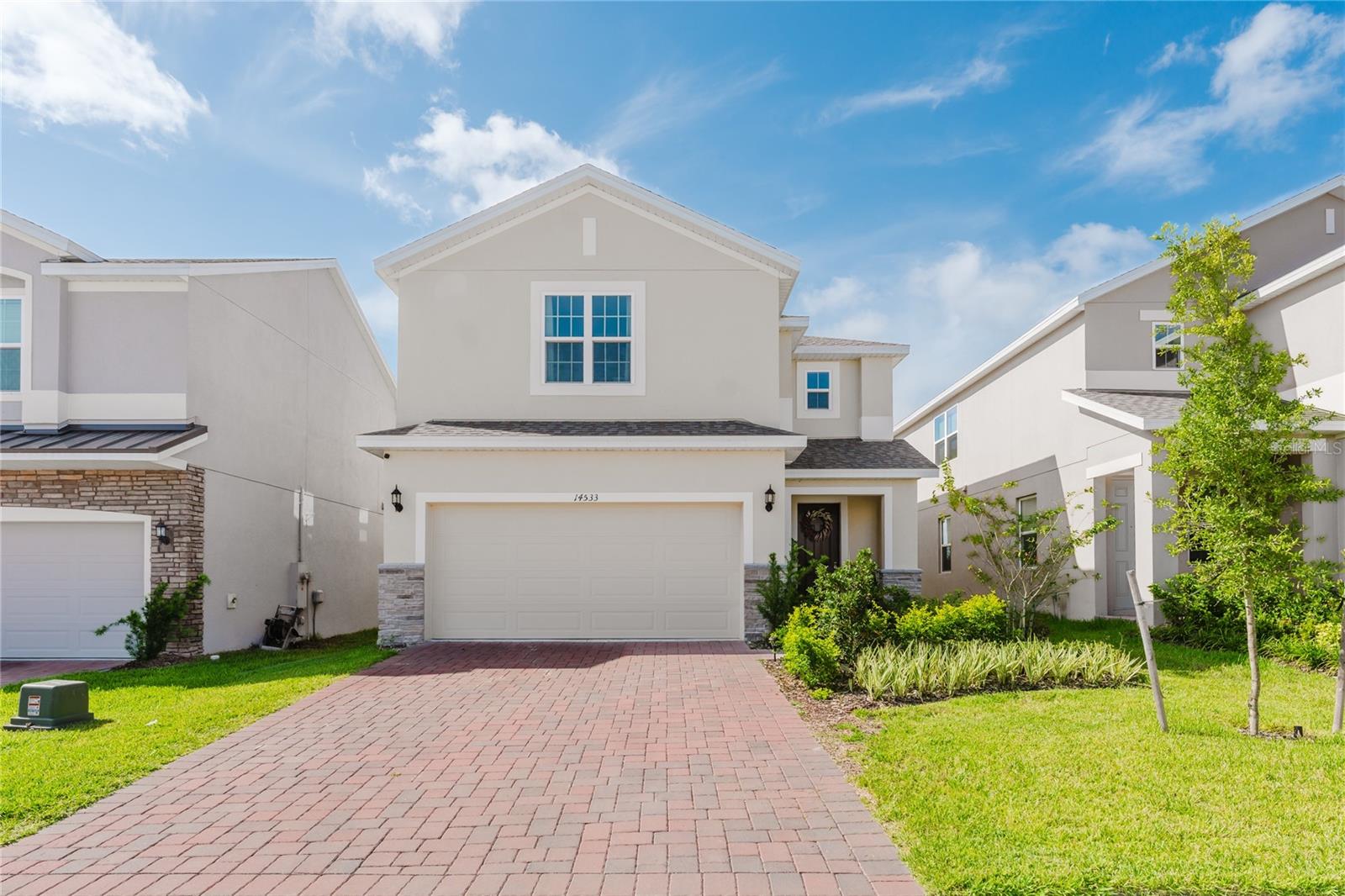 Welcome to this recently built and already beautifully upgraded Clermont home. It feels brand new, with recent upgrades throughout—including luxury vinyl flooring, custom wooden details in the bathrooms, custom stone work in the bathrooms, and more.
Step inside to an open-concept floor plan filled with natural light. The chef’s kitchen features sleek modern cabinets, a stunning oversized quartz island that seats up to six, and all-new appliances. Upstairs, a spacious loft-style living room offers the perfect spot for relaxing or entertaining.
The bathrooms are true standouts: the half-bath is accented with rare translucent Cristallo stone for a touch of elegance, while the master bath showcases upgraded cabinets, porcelain tile flooring, and refined finishes. Even the garage is thoughtfully designed with cabinets and a quartz countertop, making it ideal as a prep space or outdoor kitchen extension.
This home is steps anticipated Olympus Project, a world-class hub for sports, wellness, dining, and entertainment. With easy access to US-27, Schofield Road, Bradshaw Road, and the planned Wellness Way Boulevard, you’ll also be minutes from Disney, Waterfront Park, and more.