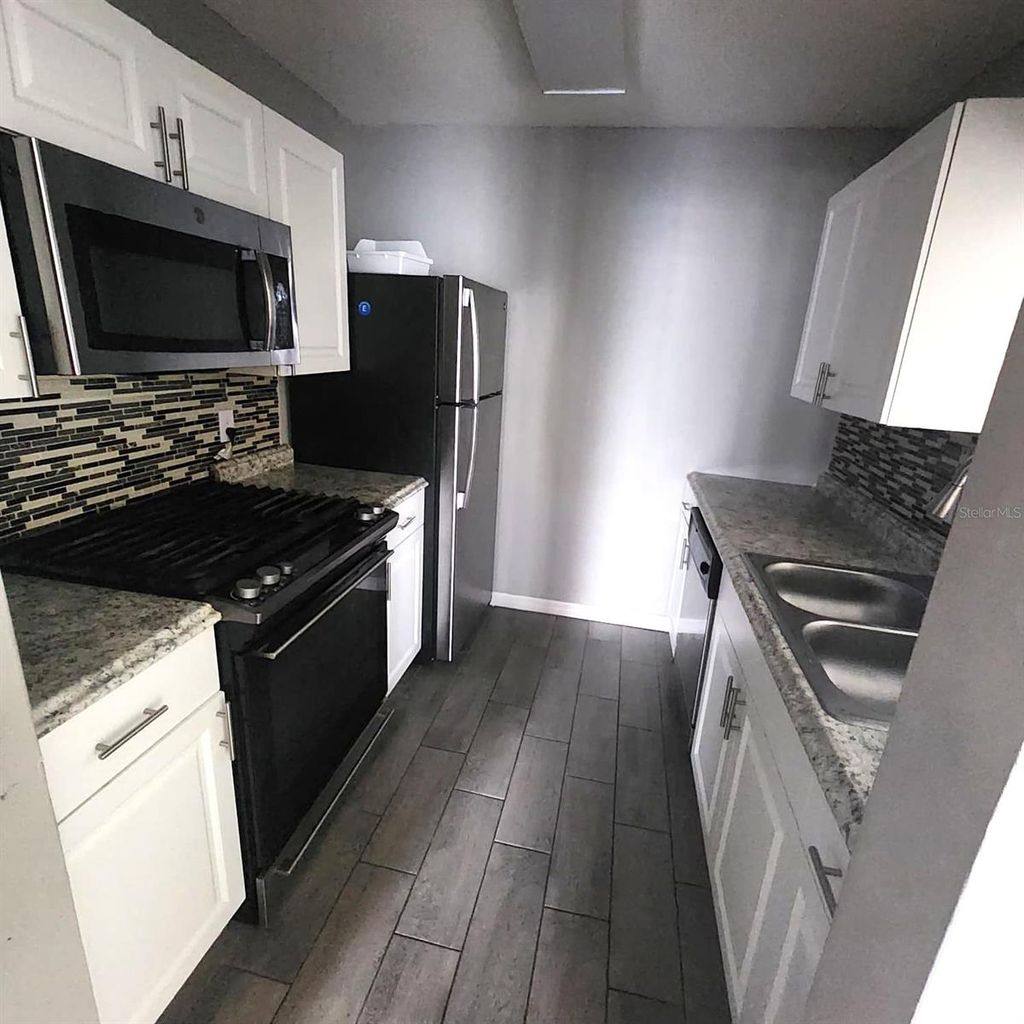 Photo of 2040 San Marcos Drive SE #105, Winter Haven, FL 33880 (MLS # O6376896)