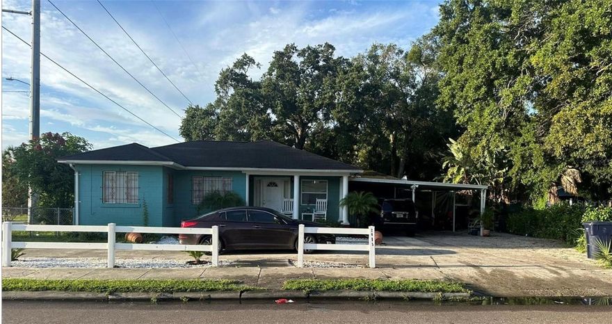 Investor OR New Homeowner?? Builder or Investor Opportunity??? This is your chance to purchase a beautiful solid block 4 Bed/2 Bath 2,250 total sq.ft home located on an oversized 9,200 sq.ft double lot in the heart of Tampa. This property is on an oversized corner lot and is perfect for a move-in ready family desiring space and ease. This property is also great for an investor wanting to snag an affordable investment opportunity in the central  part of the city, or a builder seizing the opportunity to develop 2 new modern homes like the others being built in the area. The opportunities are endless! Plumbing has been recently updated to PVC, Central Air & Heat has been recently serviced, there is solid tile floors throughout Property is located 5 minutes to central Ybor, 8 minutes to armature works, 10 minutes to Amelia Arena, 10 minutes to Seminole Hard rock casino, 10 minutes to Florida State Fairgrounds, 15 minutes to USF. Property is sold AS-IS. Only serious inquiries! Buyer must provider POF with all offers.