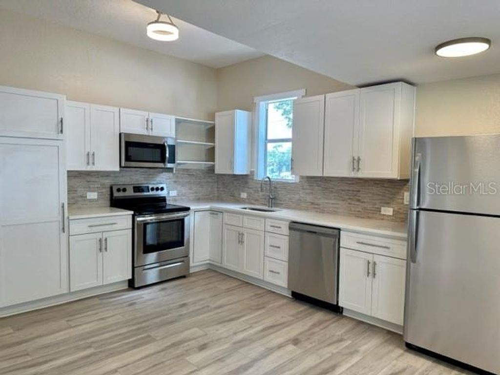 Photo of 106 E Hanna Avenue, Tampa, FL 33604 (MLS # C7515145)