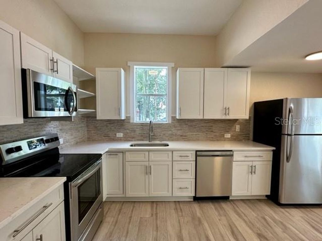 Photo of 106 E Hanna Avenue, Tampa, FL 33604 (MLS # C7515145)