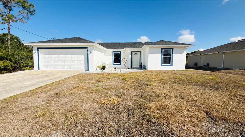 Photo of 2616 27th Street W, Lehigh Acres, FL 33971 (MLS # C7522777)