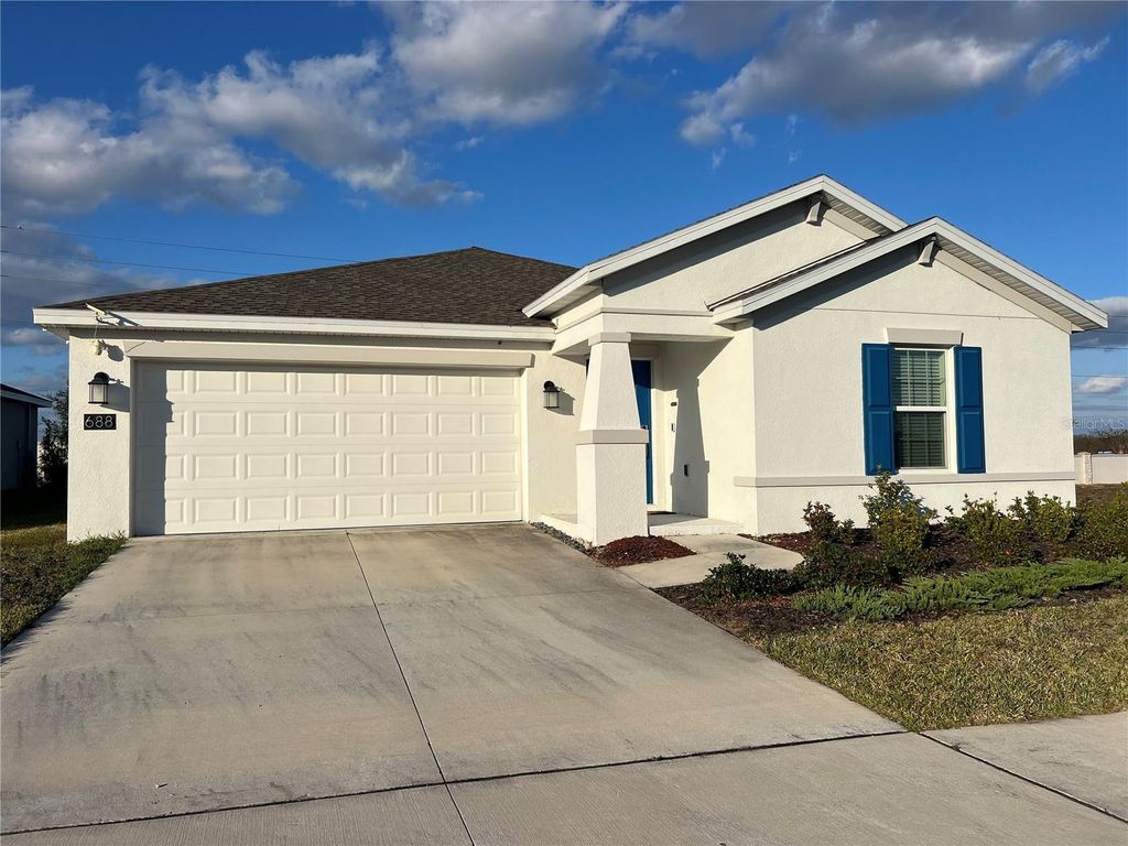 Photo of 688 Silver Palm Drive, Haines City, FL 33844 (MLS # O6373315)