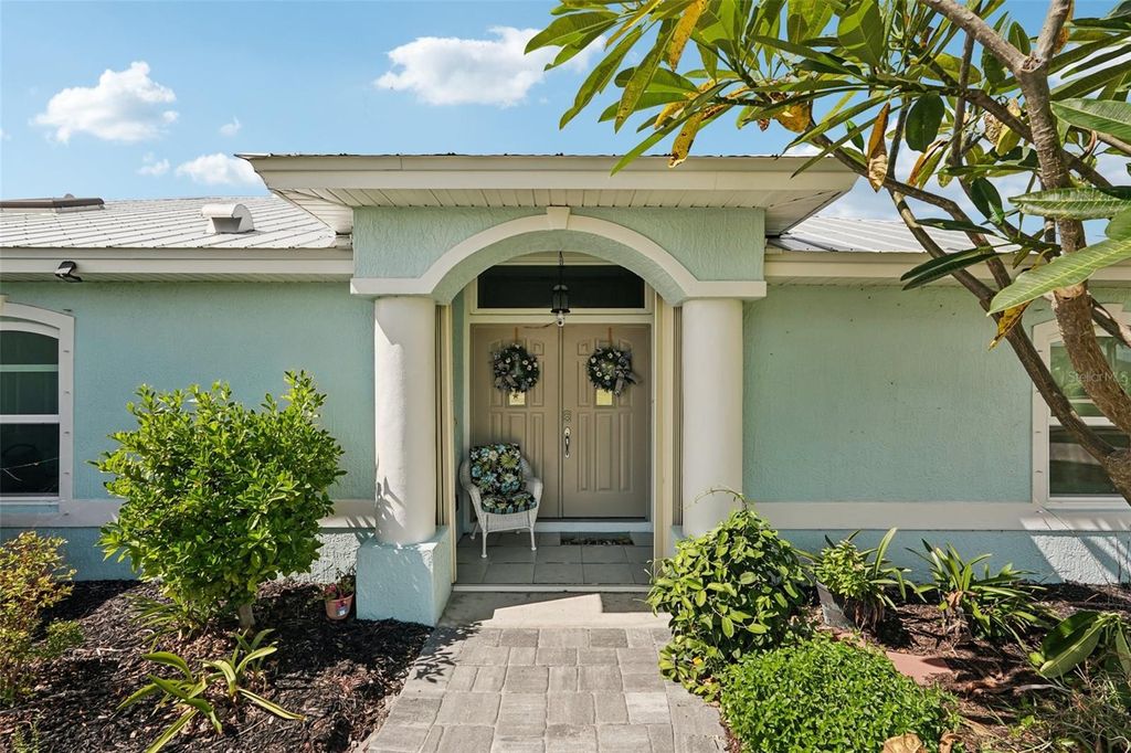 Photo of 409 Boundary Boulevard, Rotonda West, FL 33947 (MLS # A4667999)