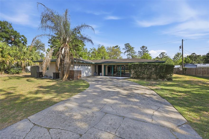 Excellent Location in Northwest Gainesville! This charming 3-bedroom, 2-bath concrete block home offers comfort, convenience, and endless potential in one of Gainesville’s most desirable areas. Located just minutes from the University of Florida and Santa Fe College, this property is perfect for those attending local colleges, first-time home buyers, investors, or anyone looking to enjoy easy access to top-rated schools, shopping, dining, and everyday conveniences.

Step inside to find a bright and inviting living room filled with natural light from the large front window. The functional layout flows seamlessly into the spacious kitchen, featuring ample counter space for cooking and entertaining. Adjacent to the kitchen is a dining area plus an additional flex space ideal for a home office, hobby room, study area, or playroom.

The oversized Florida room provides even more versatile living space — create your dream home gym, game room, relaxing sunroom, or private indoor/outdoor retreat. Additional features include an indoor laundry room, attached 2-car garage, and a welcoming covered front porch perfect for enjoying your morning coffee.

Don’t miss this opportunity to own a well-located home just in time for the new semester at the University of Florida!