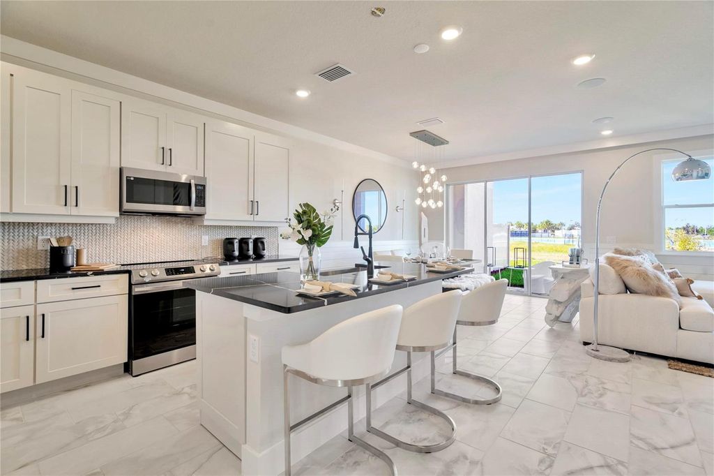 Photo of 31874 Oyster Pier Court, Wesley Chapel, FL 33545 (MLS # TB8431895)