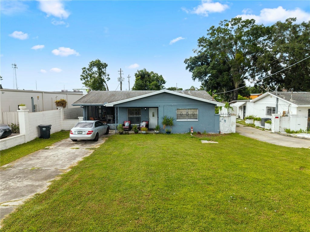 Photo of 8410 N Grady Avenue, Tampa, FL 33614 (MLS # A4701985)