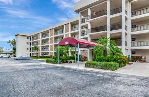 Photo of 7461 W Country Club Drive N #203, Sarasota, FL 34243 (MLS # A4693369)