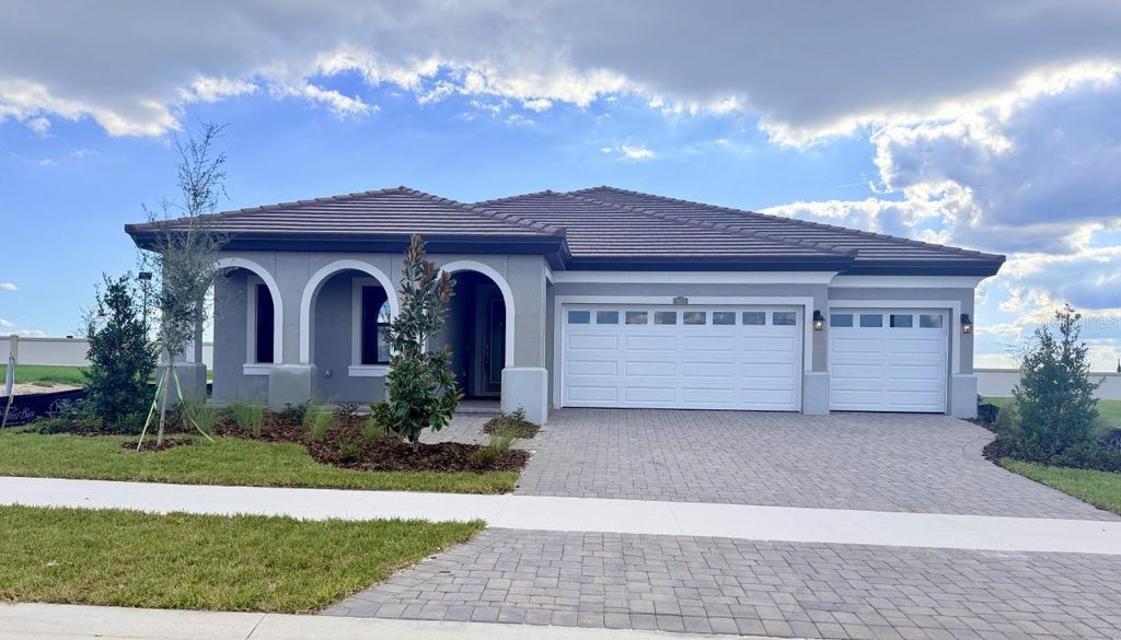 Photo of 9655 Natural Oaks Point, Dade City, FL 33525 (MLS # TB8534370)
