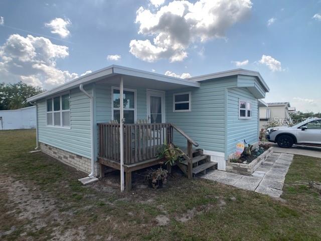 This 2-bed, one bath, fully-furnished home is a rare find in an over 55 Coop community. The primary bedroom is larger and the bath has a double walk-in shower. Amazing large cathedral open plan eat-in kitchen and living room with wood-look laminate floor and 23 feet of new kitchen cabinets and counters. New roof on living area in 2024 and a new tandem carport, laundry room, and ample bonus storage room added in 2025. Insulated double pane double hung windows throughout with a large cozy well well-insulated Florida Room with its own independent AC. Bryant Heat Pump system was replaced in 2022. Amenities include a clubhouse with plenty of planned activities, a large heated community pool, shuffleboard, and a fenced storage area for RV's and boats. Buyer approval is required. One indoor cat or a service dog is allowed. Park is conveniently located near US-41 and I-75 making Bradenton, Sarasota, Tampa and St Pete an easy drive - all with unlimited shopping, beaches, and restaurants. Move-in Ready! Schedule a showing today! For financing please contact Jennifer Caskey at South State Bank, Valrico FL.