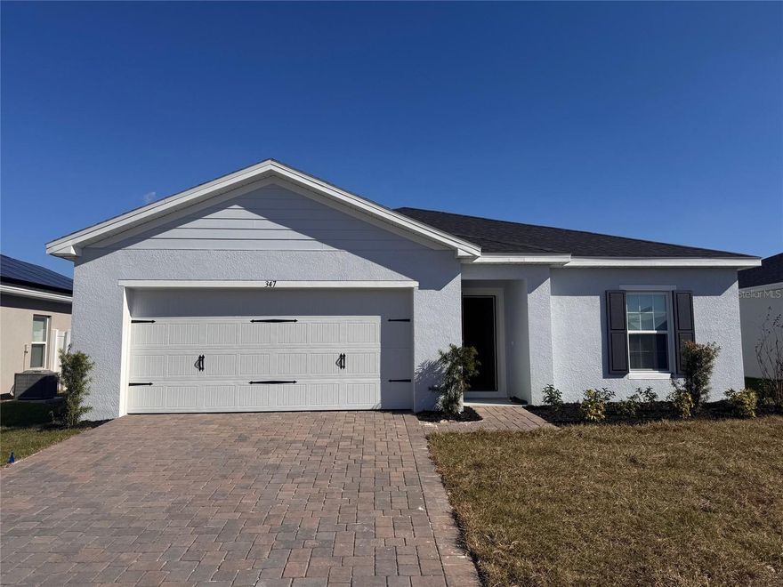 BRAND NEW 4-bedroom home available for rent is located in Dundee, Florida in the desirable community of CRYSTAL LAKE PRESERVE. This home features an open concept floor plan, 4 bedrooms and 2 full baths complete with energy efficient appliances, spacious granite/quartz countertops, updated backsplash in the kitchen, custom wood cabinets, smart home features,  an attached two car garage. This home has a master suite complete with a massive walk-in closet, as well as a utility room, covered back patio and front yard landscaping and irrigation. Minutes from Disney World and LEGOLAND.