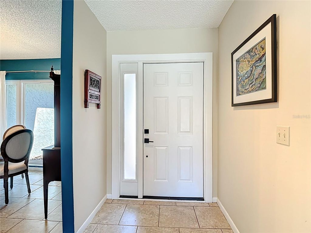 Photo of 9416 Bellhaven Street, Temple Terrace, FL 33637 (MLS # TB8481954)