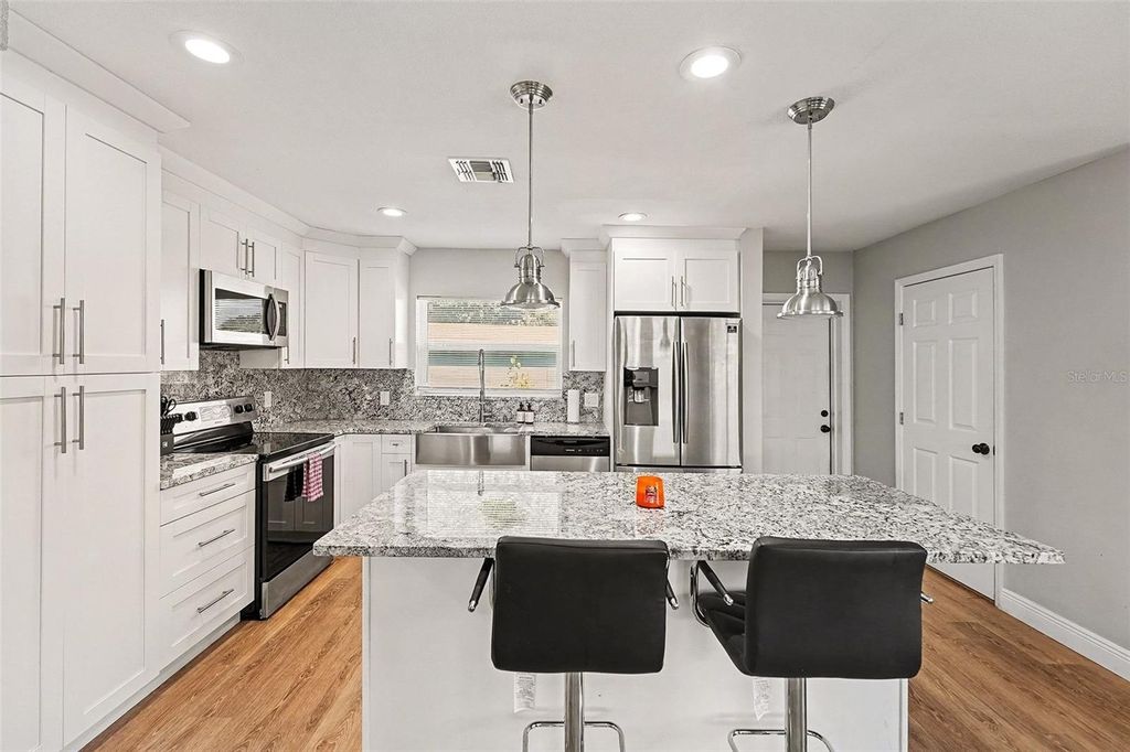 Photo of 6504 N 21st Street, Tampa, FL 33610 (MLS # TB8457066)