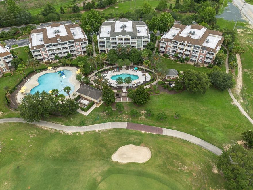 Luxury, Lifestyle and Legacy!  Let’s not forget Location! There are only a few Villas in Reunion that will provide you exclusive golf course views and be within steps of the 2 dedicated Villa Pools and water features.   This is your second-floor updated villa property that you have waited for, and it won’t last long.  Welcome to 7600 Sandy Ridge Drive Unit 204.  The property will have an ACTIVE REUNION MEMBERSHIP that can be transferred to the new owner.  The unit is NOT in a rental program and is in impeccable condition.  A bright and breezy feel inside with tons of natural light that flows in from the multiple windows.  The property is an end unit that also includes it's own PRIVATE storage closet.  Once inside you will notice the multiple upgrades that include the new flooring, lighting, furniture and a re-imagined master bath and shower.   This highly desirable open-air floor plan is perfect for those wanting the best of what Florida Villas inside Reunion showcase.  With two private guest rooms and accompanying baths, the master is positioned away from guests’ rooms and has dual closets and also a double vanity.  At 1755 square feet this unit has all the space you need to just relax and enjoy.  An added feature is that this unit will come fully furnished.  LOCATION might just be the reason you buy this one.  You get both Golf Course Views and are literally footsteps to two resort exclusive pools and water features.  This is THE ONLY LOCATION in Reunion that will give you that.  Pay special attention to the photos and you will see why.   Live, Vacation, and Invest in REUNION!  A Gated Community, Reunion is home to 3 Signature Golf Courses, the Nicklaus, the Palmer and The Watson. It is A Golf Cart Friendly community that is filled with activities for all, including Tennis, Putt-Putt, A Golf Simulator, Pickle Ball, Member Events, Parties and a world class Waterpark that has something for all ages including its own lazy river!  Reunion is super close to theme-parks, shopping, and beaches and is minutes to Disney.  Don't let this one get away- Call and schedule your private showing today!