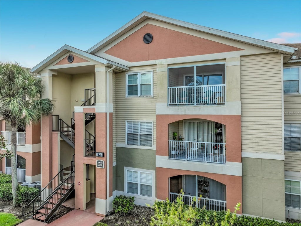 Photo of 1939 Summer Club Drive #215, Oviedo, FL 32765 (MLS # O6440583)