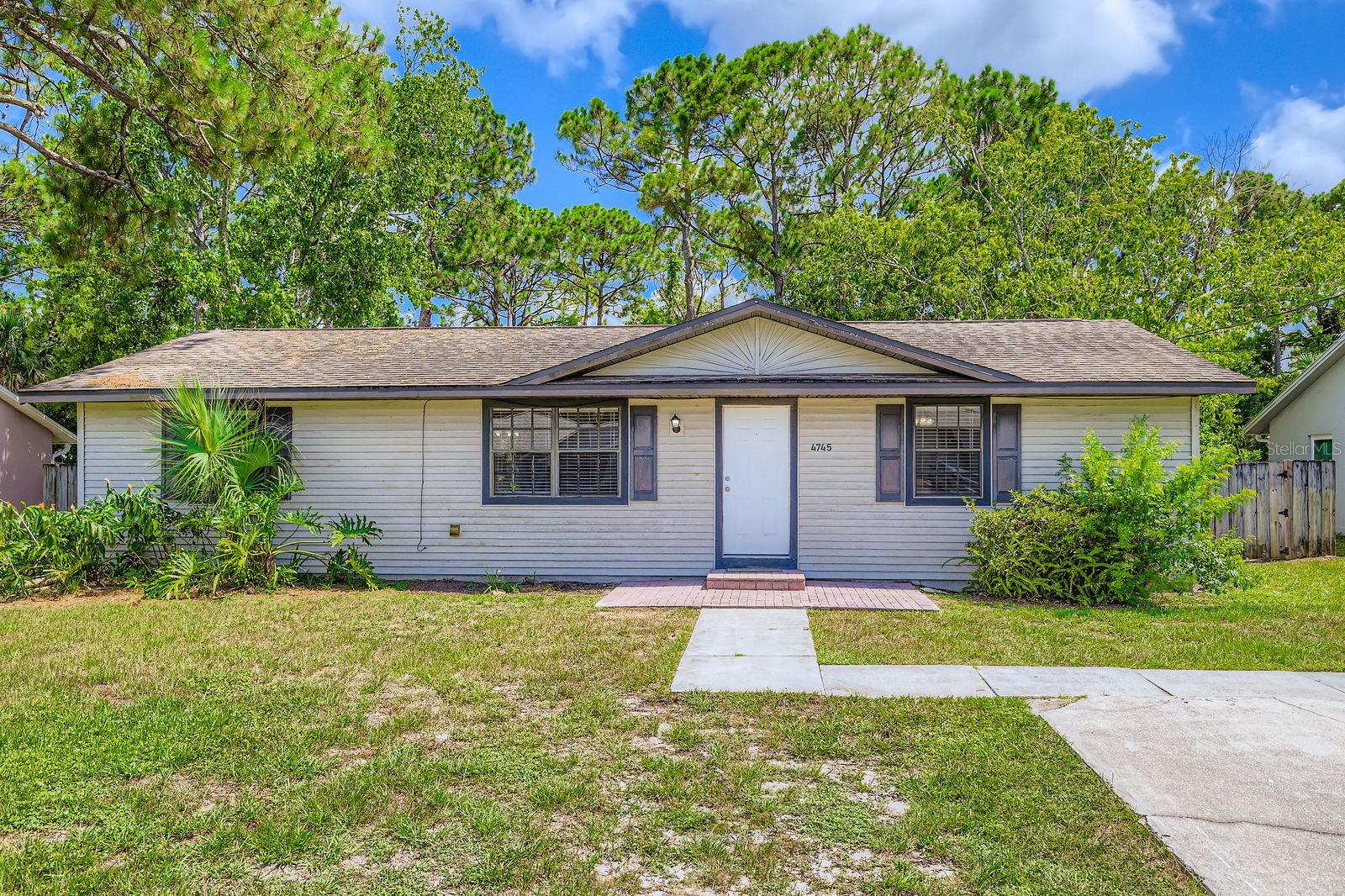 Welcome to 4745 Brookhaven St, Cocoa, FL 32927—a thoughtfully updated home with room to make it your own, now featuring brand new luxury vinyl plank (LVP) flooring and fresh interior paint. The property offers a welcoming front yard, a brick entry path, and great curb appeal.
Inside, vaulted ceilings in the spacious living room create an open and airy feel. The kitchen includes stainless steel appliances and a convenient laundry closet, flowing into the dining area with sliding glass doors that lead to the backyard. Just off the dining room, the primary suite offers a spacious closet and an en-suite bathroom with a single-sink vanity, separate shower, and soaking tub.
Some photos have been virtually staged.
Down the hall, you'll find two secondary bedrooms with generous closet space and a full bathroom with a shower/tub combo. A utility closet between the kitchen and living room adds extra convenience.
The backyard is roomy and private, with a grassy area ideal for pets or play, and a shed for added storage.
Don’t miss your chance to see this inviting space—schedule your tour today!