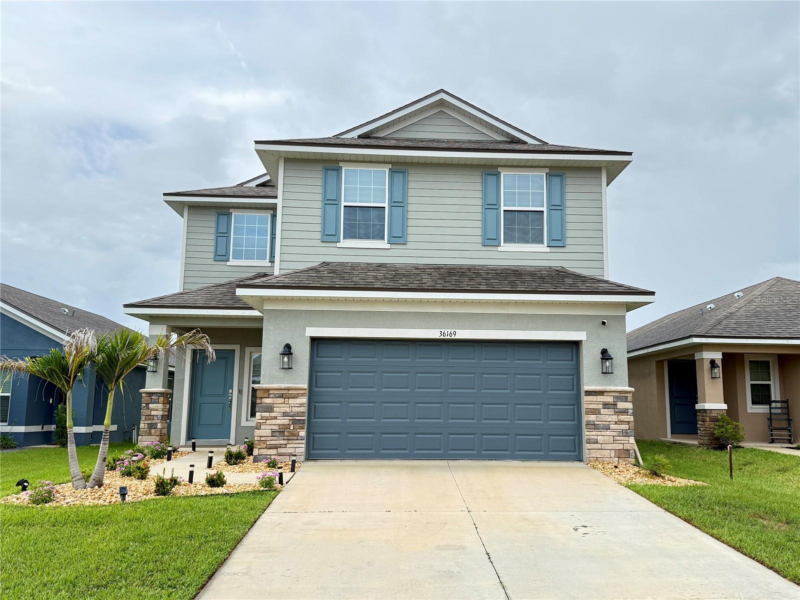 BE THE FIRST TO ENJOY THIS BRAND-NEW 4-BEDROOM, 2.5-BATH HOME IN THE SERENE COMMUNITY OF ABBEY GLEN IN DADE CITY. BUILT IN 2024, THIS TWO-STORY RESIDENCE OFFERS 2,202 SQFT OF MODERN LIVING SPACE DESIGNED FOR COMFORT AND FUNCTIONALITY. THE OPEN FLOORPLAN FEATURES CERAMIC TILE ON THE MAIN LEVEL AND CARPETED BEDROOMS UPSTAIRS. THE KITCHEN IS FULLY EQUIPPED WITH STAINLESS STEEL APPLIANCES, A MICROWAVE, DISHWASHER, REFRIGERATOR, AND A TRASH COMPACTOR. UPSTAIRS, YOU’LL FIND FOUR BEDROOMS INCLUDING A SPACIOUS PRIMARY SUITE WITH WALK-IN CLOSET, PLUS A CONVENIENT SECOND-FLOOR LAUNDRY ROOM. ENJOY CENTRAL AIR CONDITIONING AND HEATING, A 2-CAR GARAGE, AND A QUIET, WELL-MAINTAINED STREET PERFECT FOR RELAXED LIVING. THIS HOME OFFERS A RARE OPPORTUNITY TO LIVE IN A NEW CONSTRUCTION PROPERTY SURROUNDED BY PEACE AND PRIVACY—IDEAL FOR ANYONE SEEKING A QUIET, FAMILY-FRIENDLY NEIGHBORHOOD WITH MODERN AMENITIES. SCHEDULE YOUR PRIVATE TOUR TODAY!