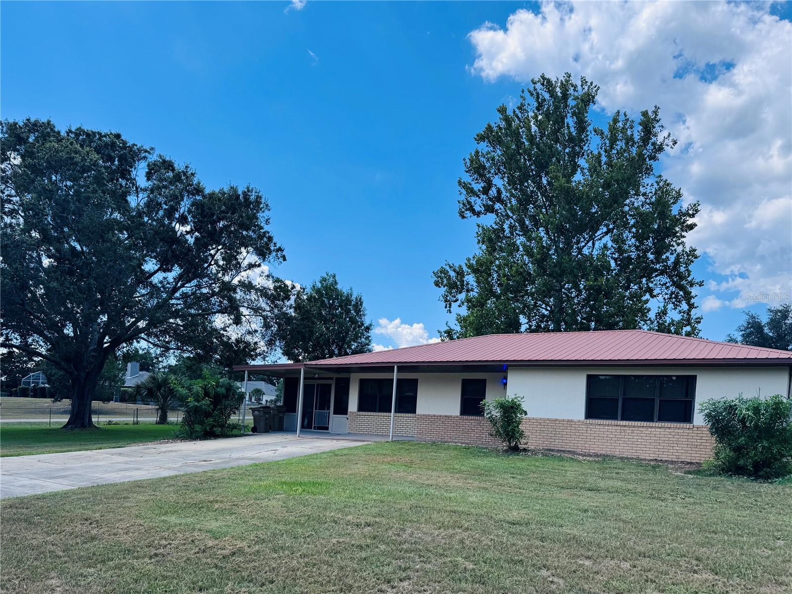 This well-maintained home offers 3 bedrooms, 1.5 bathrooms, and sits on a generous 1+ acre fenced lot—perfect for enjoying privacy and space. The property features a detached 2 car garage that's fully equipped with electric and water, ideal for a workshop, studio, or extra storage. Your new home also has a metal roof and a newer AC system that's just a couple of years old, offering peace of mind and energy efficiency. Don’t miss the chance to own this versatile property with plenty of room to grow!