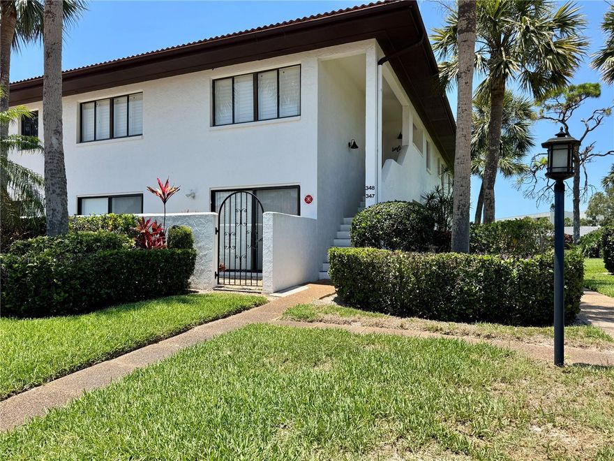 Welcome to this 1st-floor all-age condo that epitomizes effortless luxury and convenience. This turn-key furnished residence boasts 3-bedrooms, 2-full baths, and a carport.  It provides a perfect blend of spaciousness and comfort. Revel in the stunning views of the IMG GOLF COURSE from the comfortably furnished lanai. The interior features an open floor plan that seamlessly connects the living spaces, highlighted by a RECENTLY REMODELED KITCHEN adorned with stone countertops. The kitchen's modern design sets the stage for culinary delights, while the stone countertops extend to both bathrooms, adding a touch of sophistication to these spaces. Immerse yourself in the tasteful ambiance of this beautifully furnished condo, where neutral tones create an inviting and timeless atmosphere. Safety and durability are prioritized, with the sliding doors facing the golf course being upgraded to IMPACT-RESISTANT WINDOWS(2022).  Enjoy the outdoor patios -- One to the front of the home and the second overlooking the golf course. Convenience is essential, as this condo is strategically located near the airport, IMG Academy, State College of Florida, shopping destinations, Anna Maria Island, pristine beaches, and upscale dining options. Embrace the Florida lifestyle in this meticulously maintained and thoughtfully appointed condo, where every detail has been carefully curated for your comfort and enjoyment.