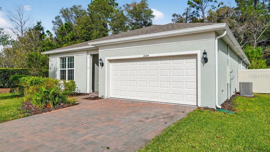 Photo of 2004 Canopy Terrace Boulevard, Deland, FL 32724 (MLS # V4946330)