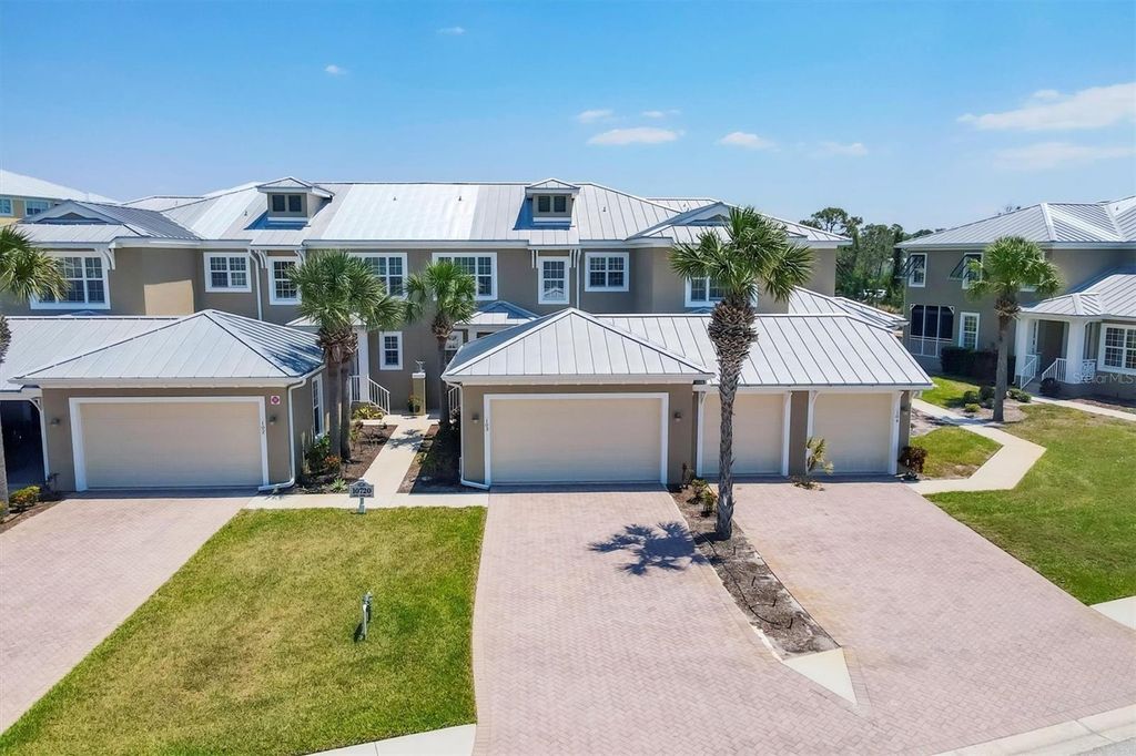 Photo of 10720 Lemon Creek Loop #103, Englewood, FL 34224 (MLS # A4673452)