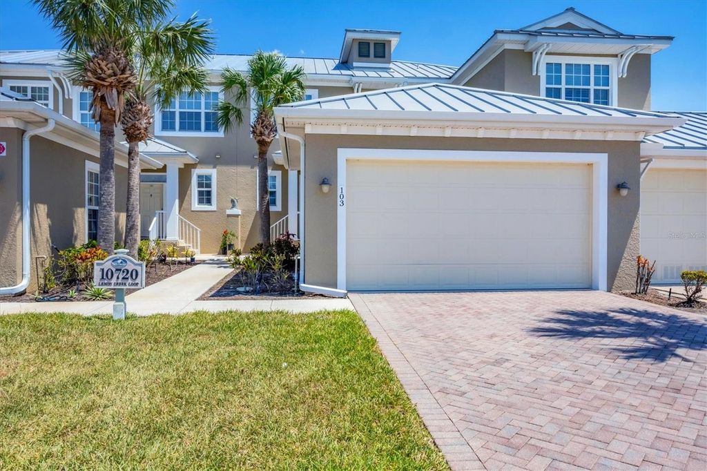 Photo of 10720 Lemon Creek Loop #103, Englewood, FL 34224 (MLS # A4673452)