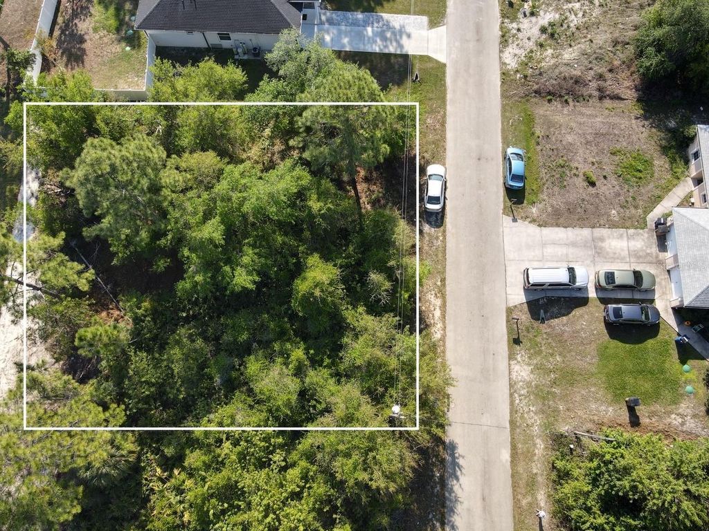 Photo of 4648 25th Street SW, Lehigh Acres, FL 33973 (MLS # C7524067)