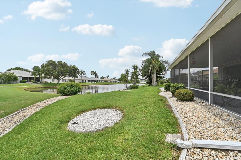 Photo of 2306 Emerald Lake Drive, Sun City Center, FL 33573 (MLS # TB8396367)