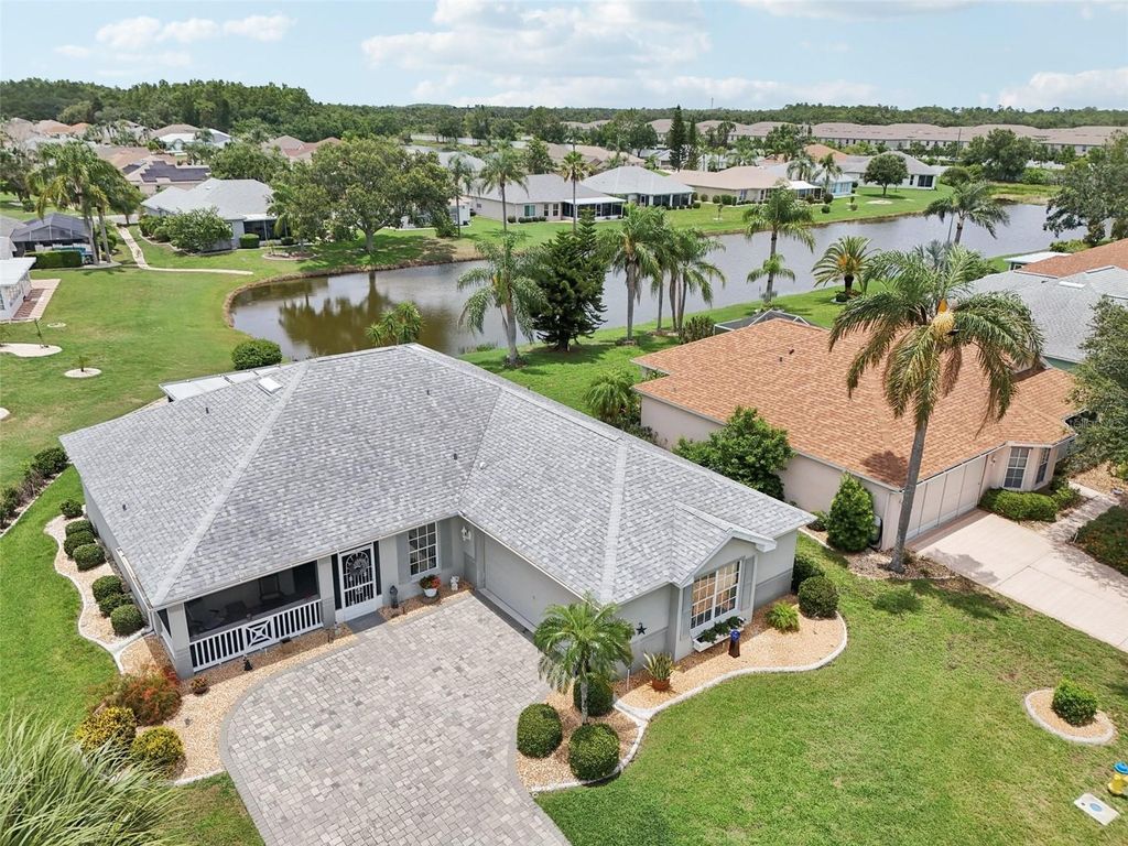 Photo of 2306 Emerald Lake Drive, Sun City Center, FL 33573 (MLS # TB8396367)