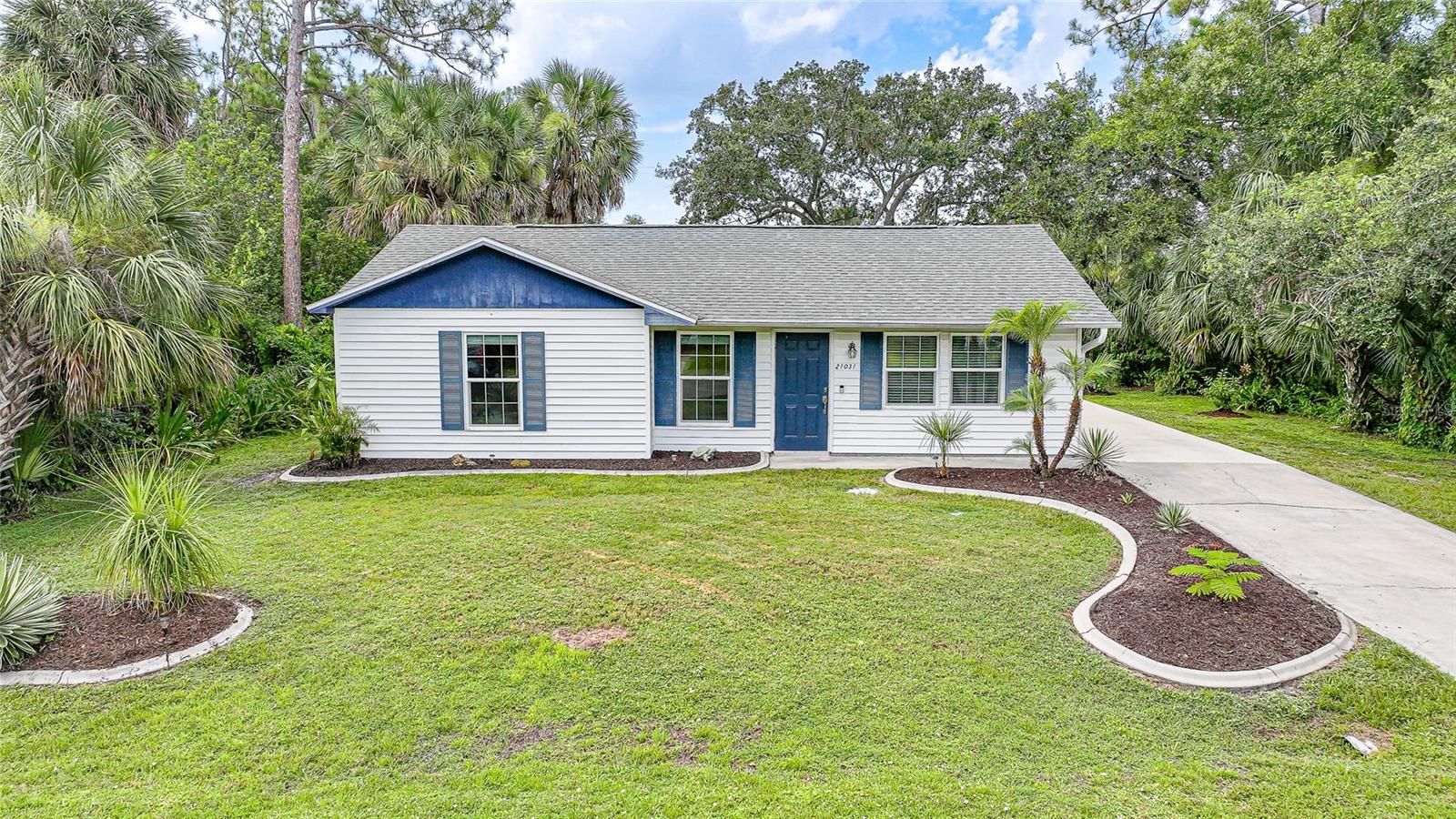 This beautifully maintained 3-bedroom, 1.5-bathroom home offers 1,080 square feet of comfortable living space and is nestled in an X flood zone, meaning no flood insurance is required—a rare and valuable feature! Plenty of new upgrades including a NEW roof in 2023, IMPACT WINDOWS, the A/C system was updated in 2018, NEW electrical panel in 2024, and the entire home was repiped in 2021 providing modern comfort and reliability. From the moment you arrive, you'll appreciate the extended slab and driveway, providing plenty of room for extra parking, a boat, or even a small RV. Step inside to discover a bright and welcoming interior featuring impact-resistant windows and doors throughout, offering both security and energy efficiency. The heart of the home is the functional kitchen, equipped with durable formica countertops, tile flooring, and ample cabinet space—perfect for everyday living or entertaining guests. Just off the kitchen, step out into your private lanai (added in 2015) and enjoy your lush landscaping, where you can relax with your morning coffee or host evening gatherings in the shade. Enjoy peace of mind with all the major updates already completed for you. The full bathroom features a convenient shower, while the additional half bath adds flexibility for guests or busy mornings. Each of the three bedrooms offers comfortable living space with plenty of natural light and closet storage. Whether you’re a first-time homebuyer, seasonal resident, or investor, this home is sold fully furnished—down to the dishes—so all you have to do is bring your suitcase. Located in a quiet, well-established neighborhood with no HOA, you're just minutes from shopping, dining, schools, and the white-sand beaches that Southwest Florida is famous for. Don’t miss out on this turnkey gem—schedule your private showing today and start living the Florida lifestyle you've been dreaming of!