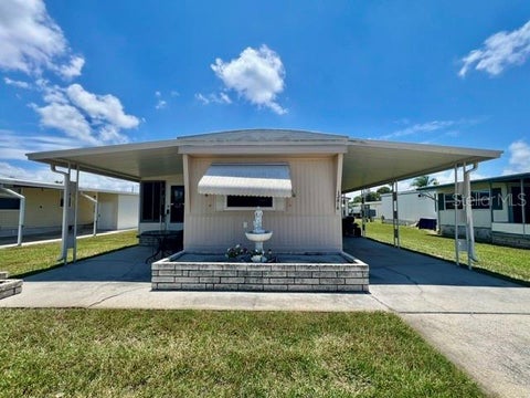 Photo of 10818 Freedom Drive, Port Richey, FL 34668 (MLS # W7887014)