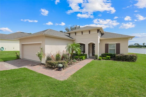 Photo of 124 Islabella Way, Groveland, FL 34736 (MLS # G5118437)