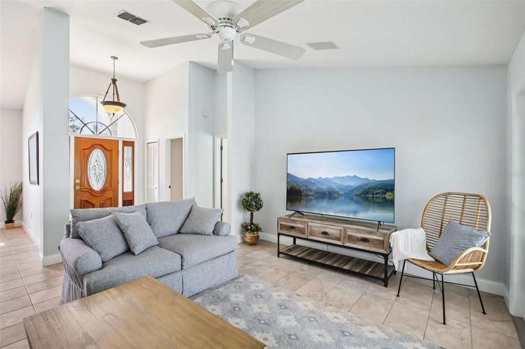 Photo of 2654 Crystal Circle, Dunedin, FL 34698 (MLS # O6358555)