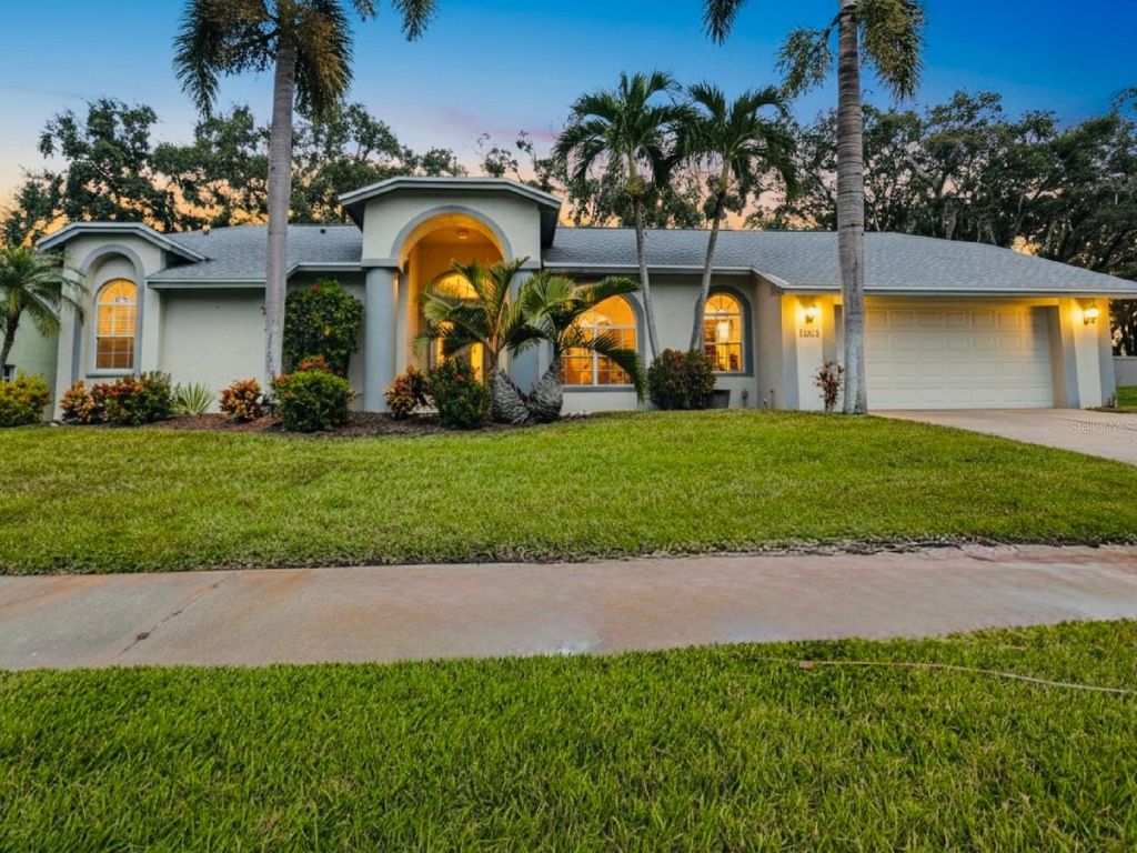 Photo of 2654 Crystal Circle, Dunedin, FL 34698 (MLS # O6358555)