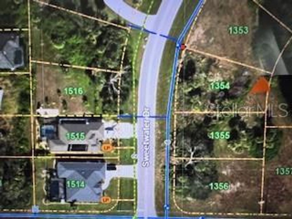 Photo of 305 Sweetwater Drive, Rotonda West, FL 33947 (MLS # C7512313)