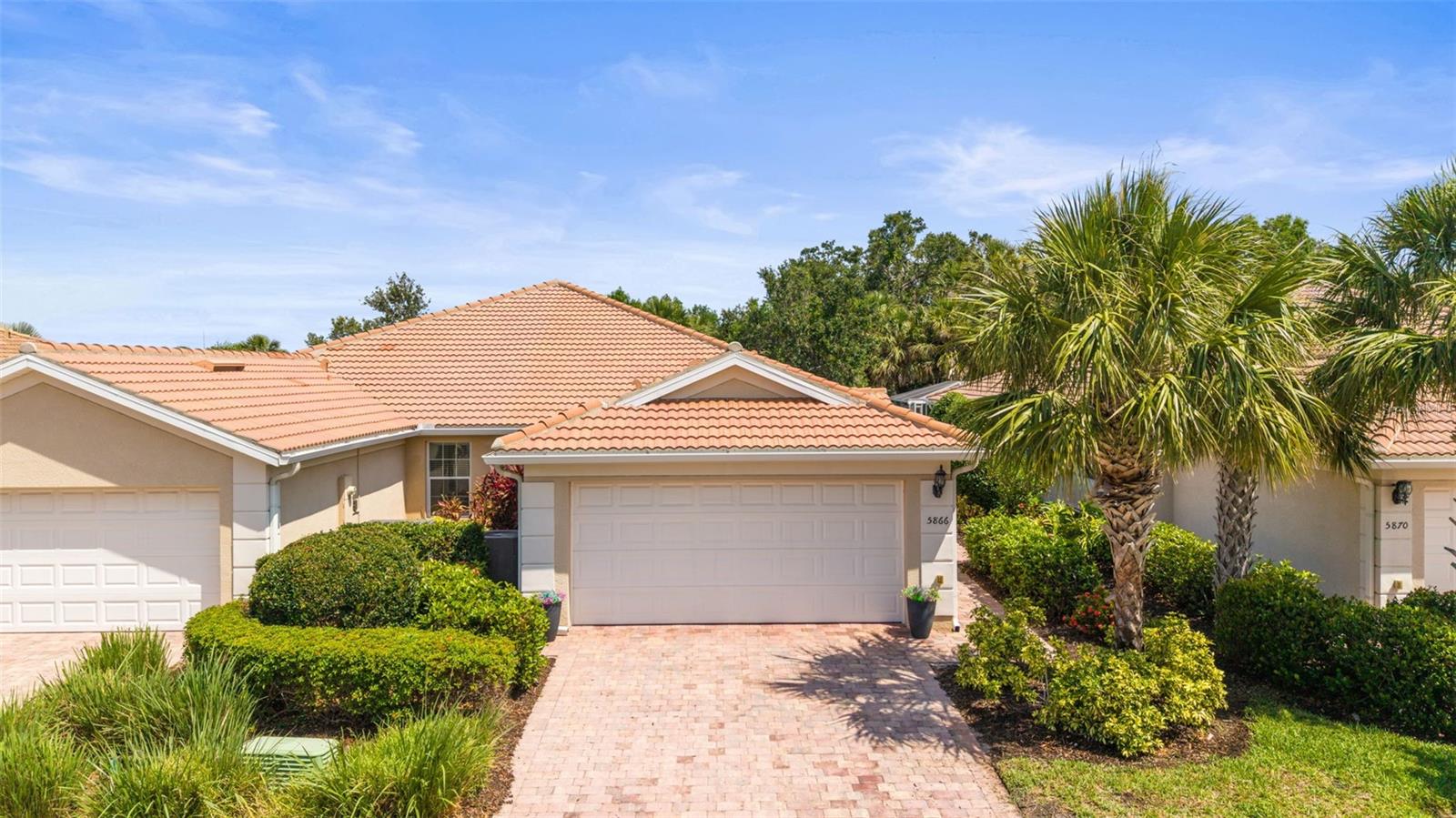 Florida is calling!!
Step into this immaculate Carrington model 3-bedroom villa, perfectly situated in one of Sarasota’s most picturesque communities. From the moment you walk in, you'll love the spacious open layout featuring large tile flooring throughout the main living areas.
The kitchen is a chef’s dream with granite countertops, stainless steel appliances, a closet pantry, ample cabinet space, and newer range and refrigerator—perfect for everyday living and entertaining. The primary suite offers a relaxing retreat with a walk-in closet and private ensuite bath. The second bedroom also features a walk-in closet and cozy carpeted flooring, while the third bedroom—with tile flooring and French doors—makes an ideal home office or guest room. Enjoy the convenience of a two-car garage with attic storage and a dedicated laundry room complete with a utility sink and a newer dryer. The air conditioning unit was replaced in 2022. The covered, screened lanai is the perfect spot to unwind or entertain guests year-round. Enjoy top-tier amenities including a stunning clubhouse with a card room, fitness center, and catering kitchen. Take a dip in the year-round geothermal heated pool or enjoy a game on the basketball/pickleball courts, 4 lit Har-Tru tennis courts, or bocce ball court. There's even a playground for the little ones and an on-site activities director and HOA manager to enhance your lifestyle.
Conveniently located just minutes from the world-famous Siesta Key Beach, the scenic Legacy Bike Trail, Publix, Costco, and some of the area’s best shopping and dining. Don't miss your chance to live in luxury—schedule your private showing today!