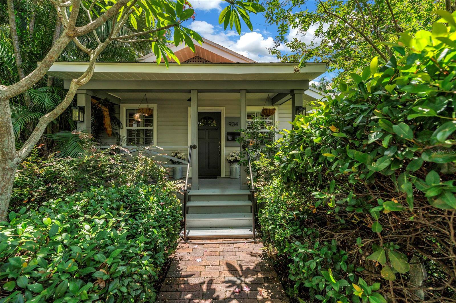 Welcome to your dream lifestyle in the heart of St. Petersburg's cherished Euclid St. Paul's neighborhood!
This impeccably remodeled 1920s bungalow is more than a home, it's a statement. Privately positioned on an oversized corner lot in a non-flood zone, the home offers a curated lifestyle where style meets intention. From the moment you step onto the inviting front porch, you'll feel the warmth of original hardwood floors underfoot, the charm of a classic woodburning fireplace, and the natural light spilling into a living space made for connection and comfort.
The kitchen is a standout—anchored by sleek stone countertops, wood-look tile, and stainless-steel appliances—designed for both the passionate cook and the everyday entertainer. Quaint dining space with the laundry room right off the kitchen with ample storage space. The open concept layout flows seamlessly into your private backyard oasis... and yes, it's every bit as extraordinary as it sounds.
Host unforgettable evenings under multiple covered patios, sip cocktails at your own outdoor bar, cozy up around the firepit, and enjoy watching tv outdoors for game day or movie night. There's even a dedicated outdoor half-bath for convenience, and the sellers are including potted plants and signage.
Inside, you'll find three spacious bedrooms, two newly updated bathrooms, fresh interior paint, and modern upgrades throughout including a brand-new HVAC system (2024) with the blue QR UV light system and Reme Halo whole home purification system, newer roof (2019), and a gas tankless water heater. The detached 1-car garage offers added storage and functionality.
Key Points in summary, Non-Flood Zone, HVAC 2024, Roof 2019, updated bathrooms, original hardwoods, outdoor oasis, very desirable location, No HOA. Travel time to; Tampa International Airport 20 minutes, Clearwater Airport 15 minutes. Downtown Saint Petersburg 10 minutes, 20–30 minutes to iconic Gulf Coast shorelines. Orlando 2 hours.
This is not just a property—it's a lifestyle you'll fall in love with the moment you arrive.