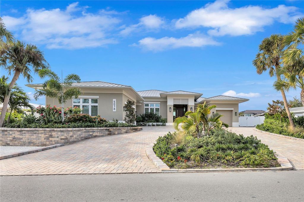 Photo of 5078 Sandy Beach Avenue, Sarasota, FL 34242 (MLS # A4678212)