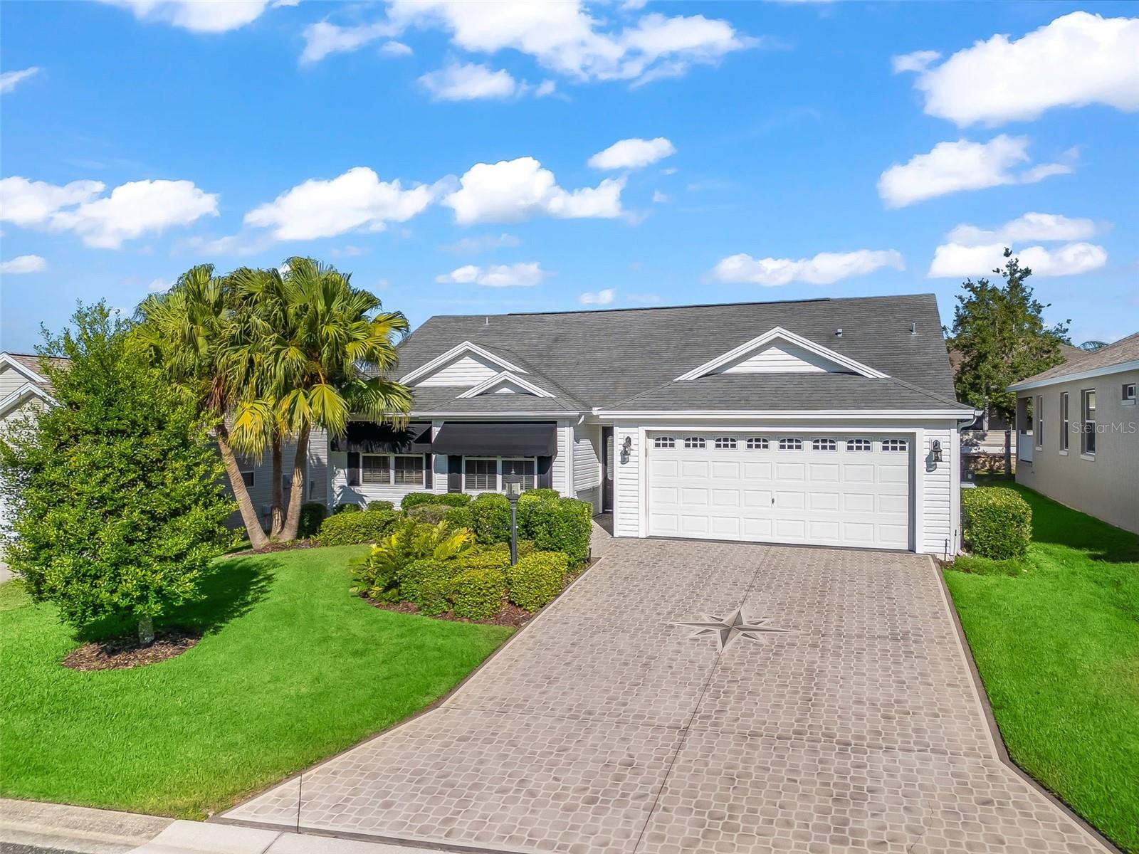 Great location close to Lake Sumter Landing in The Village of Hadley. Close to many amenities, golf courses, and shopping. This 3/2 (3rd bedroom has no closet) Designer Whispering Pine with Open Kitchen is in pristine condition. Lush landscaping and painted driveway enhance the curb appeal and landscaping in back creates natural privacy for relaxing in your screened in lanai. Large kitchen with eat in nook with bay window and extra built in wood cabinets add to the well designed kitchen. Right off the kitchen is the inside laundry room with washer and dryer. Roof (2014) (AC 2020) Bond Balance 10,381. Master bedroom has large walk in closet and en suite bathroom with double sinks. 2 other bedrooms (one with no closet give you plenty of room to host your guest. Pull down stairs in attic give you extra storage. Call today to see this beautiful home. Some photos have been virtually staged