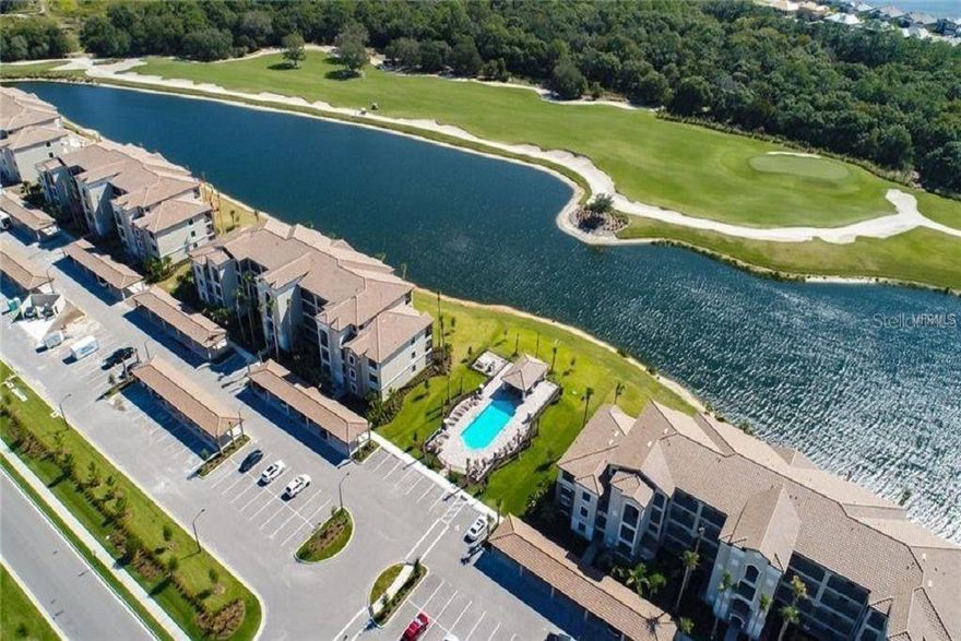 Welcome to Luxury Living at Lakewood National. 
Nestled within the highly sought-after gated community of Lakewood National Golf & Country Club in Lakewood Ranch, this beautifully maintained three-bedroom, two-bath condominium offers a rare opportunity to enjoy true resort-style living. 
Located on the second floor WITH ELEVATOR, or one flight of stairs, this desirable corner unit is one of the largest floor plans, providing exceptional privacy and abundant natural light.
Offered fully furnished, the residence features a bright, open-concept layout enhanced by elegant crown molding. The stylish kitchen is appointed with granite countertops, stainless steel appliances, and ample cabinetry, ideal for both everyday living and entertaining. The spacious primary suite includes dual walk-in closets and a modern en-suite bathroom with a walk-in shower. Two comfortable guest bedrooms and a full bath provide ideal accommodations for family and visitors. Additional highlights include in-unit laundry and covered parking. Step out onto your screened lanai and take in tranquil lake views, lush greenery, and scenic golf course vistas—perfect for enjoying both sunrise and sunset in a peaceful setting.
Residents enjoy bundled golf membership on two championship courses designed by Arnold Palmer, along with access to an impressive array of resort-style amenities, including tennis courts, pickleball courts, a state-of-the-art fitness center, a zero-entry lagoon-style pool with handicap access, six additional satellite pools, a hot tub, tiki bar, lounge areas, and clubhouse dining.
Ideally located near top-rated schools, with easy access to I-75 and close proximity to Bradenton, Sarasota, and Tampa, as well as world-class beaches, shopping, dining, and entertainment.