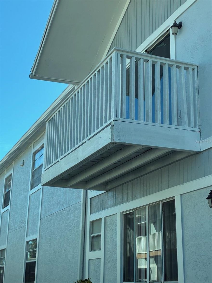 SOUTH TAMPA CONDOMINIUM! Fantastic second floor condo with a full size BALCONY! Luxury vinyl flooring throughout! Gorgeous updated kitchen with white wood cabinets, stainless steel appliances and double door refrigerator. Open concept living room with amazing space for your personal home theater! PLENTY OF NATURAL SUNSHINE! NEWLY UPDATED bathrooms ... one tub and other with a stand up shower. Primary bedroom has  DUAL closets!! WASHER and DRYER included! Plenty of closet space and storage! 1 assigned parking space. Walk to the popular Mad Dog pub, Bayshore Blvd or CVS! Fabulous location ... easy access to Selmon Express way and Bayshore Blvd! Come and tour today! Small pets okay. . . !