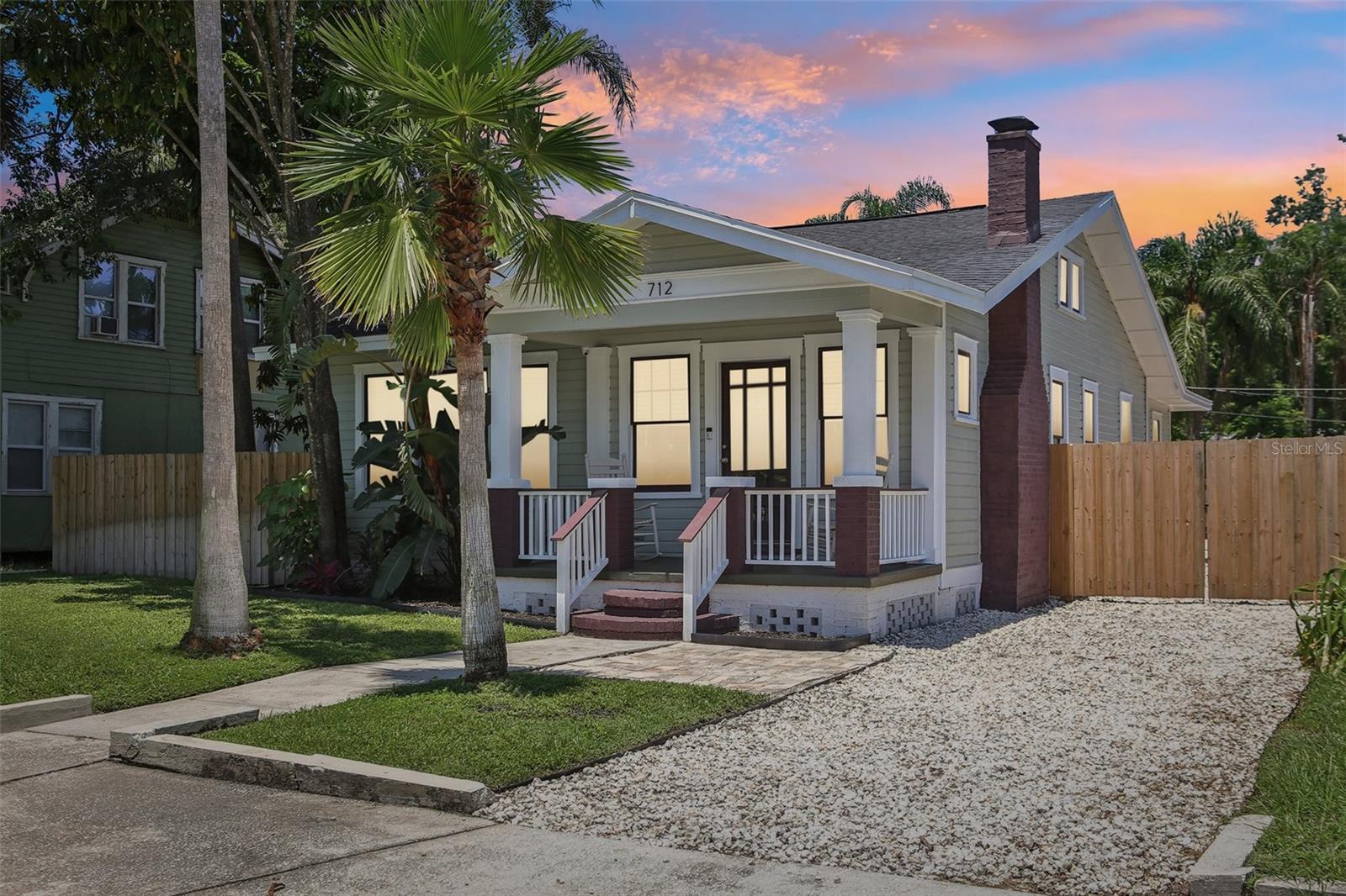 **Timeless Charm Meets Modern Comfort in the Heart of Seminole Heights!**
Step into this beautifully updated 1925 wood-frame bungalow offering the perfect blend of vintage character and contemporary living. With 2 spacious bedrooms and 2 full baths—including a private en-suite and walk-in closet in the primary suite—this home is designed for comfort and functionality.
You'll love relaxing on the inviting front porch or entertaining in the wide, open living area that flows seamlessly into a generous dining room and a large, well-equipped kitchen.
Situated on a deep 60x133 ft lot, the fully fenced backyard is a private retreat, featuring a manicured lawn, expansive deck, and plenty of space to unwind or entertain. With gate access from both the front and rear (E Wilder Ave), you'll enjoy unmatched flexibility for parking multiple vehicles, your RV, or even a boat.
Recent updates include fresh interior/exterior paint, a newer roof, and HVAC—ensuring peace of mind for years to come. Located just minutes from I-275, downtown Tampa, Water Street, Armature Works, and all the eclectic restaurants and bars that make Seminole Heights one of Tampa’s most desirable neighborhoods.