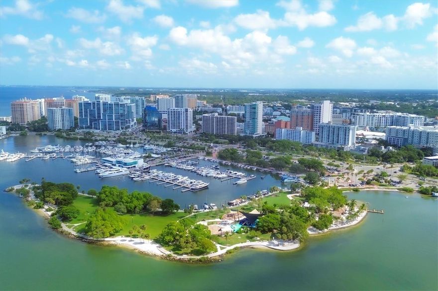 Live the Florida lifestyle where every day feels like a getaway in this well-maintained 9th-floor, 2-bedroom, 2-bath condo ideally located in the heart of downtown Sarasota. Just steps from Sarasota Bay, Bayfront Park, O'Leary's Tiki Bar & Grill, and Marina Jack, this move-in-ready residence offers the best of walkable coastal city living. Enjoy Palm Avenue views from your private balcony or step out the rear entrance for immediate access to the weekly farmers market, art festivals, dining, galleries, and shopping. The 101 Condominium features resort-style amenities including a renovated lobby, fitness center, heated pool with expansive deck and ambient evening lighting overlooking the bay and park, grilling area, pergola, and resident club space. Additional highlights include gated under-building reserved parking, storage unit, bike storage, and guest parking, all just minutes from St. Armands Circle, beautiful beaches, boating, and performances at Van Wezel Performing Arts Hall.