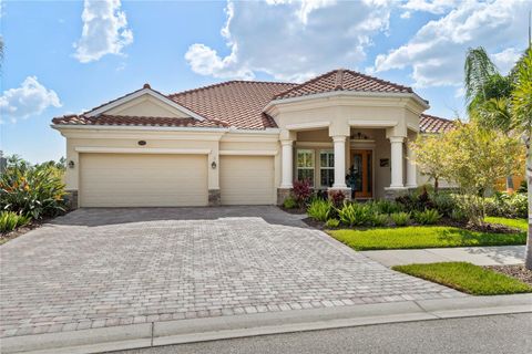 Photo of 5428 Royal Poinciana Way, North Port, FL 34291 (MLS # C7516649)