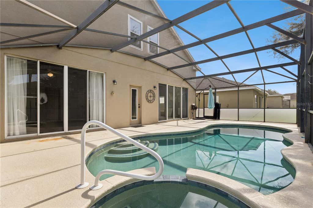 Photo of 939 Andalusia Loop, Davenport, FL 33837 (MLS # G5115461)