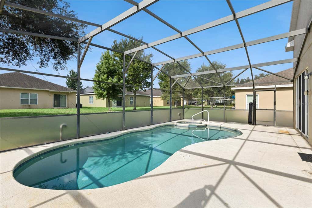 Photo of 939 Andalusia Loop, Davenport, FL 33837 (MLS # G5115461)