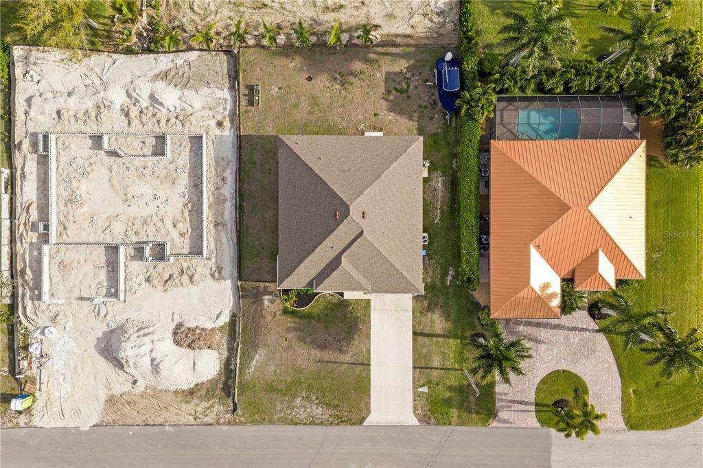 Photo of 3306 NW 21st Terrace, Cape Coral, FL 33993 (MLS # C7524321)